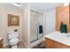 Well-maintained bathroom with a glass-enclosed shower, classic fixtures, and neutral color palette at 29145 E 160Th Ct, Brighton, CO 80603