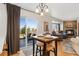 Cozy dining area next to a bright patio area and the living room has a fireplace for those cold days at 29145 E 160Th Ct, Brighton, CO 80603