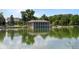 Beautiful reflection of the Smith Lake Boathouse pavilion on a calm day at Washington Park at 451 S Franklin St, Denver, CO 80209