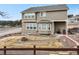 Backyard has fire pit and easy to maintain landscaping at 19703 Serenity Springs Pt, Monument, CO 80132