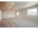 Spacious basement featuring neutral paint, wall-to-wall carpet, and recessed lighting at 19703 Serenity Springs Pt, Monument, CO 80132