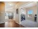 Inviting home foyer featuring gleaming hardwood floors and an entryway leading to the living spaces at 19703 Serenity Springs Pt, Monument, CO 80132