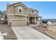 Two-story home with concrete driveway and a two car garage at 19703 Serenity Springs Pt, Monument, CO 80132