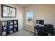 Bright office space with a workspace, shelving, and a window providing natural light and views at 19703 Serenity Springs Pt, Monument, CO 80132