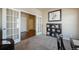 Cozy office space with carpet, storage, and natural light streaming in from the window at 19703 Serenity Springs Pt, Monument, CO 80132