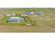 Aerial view of house and outbuildings on the property at 5129 S Tom Bay Rd, Bennett, CO 80102