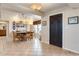 Inviting dining room features tiled floors, decorative lighting and breakfast nook at 5129 S Tom Bay Rd, Bennett, CO 80102