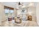 Cozy living room with comfortable seating and plenty of natural light at 5129 S Tom Bay Rd, Bennett, CO 80102