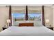 Inviting main bedroom offering ample natural light and comfortable furnishings at 5129 S Tom Bay Rd, Bennett, CO 80102