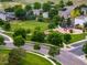 Aerial view of a neighborhood park including a playground and soccer field at 5225 E 100Th Dr, Thornton, CO 80229
