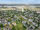 Aerial view of a well-planned community, close to lakes and a neighborhood park at 5225 E 100Th Dr, Thornton, CO 80229