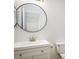 Bathroom with a vanity, and a large mirror providing a clear reflection at 5225 E 100Th Dr, Thornton, CO 80229