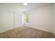 A simple bedroom with a window for natural light and a double closet for storage at 5225 E 100Th Dr, Thornton, CO 80229