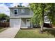 Charming two-story home with a well-maintained lawn and attached one car garage at 5225 E 100Th Dr, Thornton, CO 80229