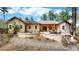 Backyard patio featuring ample seating, and manicured landscaping at 4456 Mohawk Dr, Larkspur, CO 80118