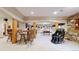 Finished basement with a bar, pool table, massage chair and comfortable seating at 4456 Mohawk Dr, Larkspur, CO 80118