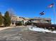 Lakewood Country Club clubhouse with American and Colorado flags at 1011 Pierce St # 5, Lakewood, CO 80214