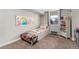 Cozy bedroom with carpet and a window for natural light at 601 W 11Th Ave # 409, Denver, CO 80204