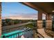 Scenic balcony view overlooking the neighborhood with a partial view of the pool and comfortable outdoor seating at 5625 Heritage Oak Dr, Parker, CO 80134