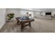 Basement featuring a pool table, plush sofa, and large TV for perfect for entertainment at 5625 Heritage Oak Dr, Parker, CO 80134