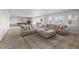 Open basement design, combining a cozy living area with a pool table and kitchen area at 5625 Heritage Oak Dr, Parker, CO 80134