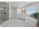 Bathroom featuring soaking tub and walk-in shower at 5625 Heritage Oak Dr, Parker, CO 80134