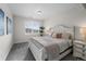 Charming bedroom with white furniture, plush bedding and natural light creates a serene space at 5625 Heritage Oak Dr, Parker, CO 80134