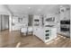 Spacious, all-white kitchen featuring a large island, modern appliances, and ample cabinet space at 5625 Heritage Oak Dr, Parker, CO 80134