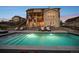 Inviting backyard pool featuring a modern design, surrounded by patio space for lounging and entertaining guests at 5625 Heritage Oak Dr, Parker, CO 80134