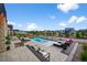 Relaxing pool area featuring patio seating, and a partially covered outdoor space at 5625 Heritage Oak Dr, Parker, CO 80134