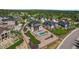 Stunning aerial view of a home with a pool, seating area, and beautifully landscaped backyard at 5625 Heritage Oak Dr, Parker, CO 80134