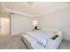 Spacious bedroom featuring a unique bed frame and neutral decor at 14437 Grape St, Thornton, CO 80602