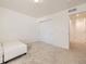 Bedroom boasts neutral walls, carpeted floor, closet, and hallway access at 14437 Grape St, Thornton, CO 80602