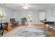 Spacious bedroom featuring hardwood floors, neutral decor, and ample natural light at 6248 S Coventry Ln, Littleton, CO 80123