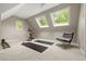 Bright exercise room with large windows and an exercise bike at 6248 S Coventry Ln, Littleton, CO 80123