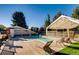 Leisurely pool area with a sunshade canopy, lounge chairs, and a building with covered walkway for relaxing by the water at 6248 S Coventry Ln, Littleton, CO 80123