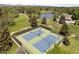 Enjoy a game of tennis on the well-maintained community tennis courts, surrounded by lush greenery and mature trees at 6248 S Coventry Ln, Littleton, CO 80123