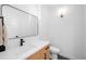 Modern bathroom with sleek vanity, stylish mirror, and contemporary lighting at 872 S Vine St, Denver, CO 80209