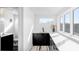 Bright bathroom featuring black cabinets, light countertops, and a modern sink at 872 S Vine St, Denver, CO 80209