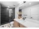 Modern bathroom with a glass shower, stylish vanity, and contemporary fixtures at 872 S Vine St, Denver, CO 80209