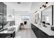 Contemporary bathroom featuring a soaking tub, walk-in shower, and dual vanity sinks with modern fixtures at 872 S Vine St, Denver, CO 80209
