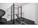 Home gym featuring workout equipment, rubber floor and open space at 872 S Vine St, Denver, CO 80209