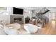 Cozy living room featuring a fireplace, contemporary decor, and hardwood floors at 872 S Vine St, Denver, CO 80209