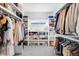 Spacious walk-in closet with organized shelving, providing ample storage for clothing and accessories at 872 S Vine St, Denver, CO 80209