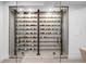 Temperature-controlled wine cellar with glass doors, and tiled floor at 872 S Vine St, Denver, CO 80209