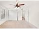 Bedroom with standard closet and ceiling fan providing comfort at 4896 S Dudley St # 8-11, Littleton, CO 80123