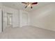 Spacious bedroom with neutral carpeting and ample natural light at 16051 E Geddes Dr # 66, Aurora, CO 80016