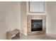 Cozy fireplace featuring tile surround, creating a warm focal point in this inviting living space at 16051 E Geddes Dr # 66, Aurora, CO 80016
