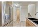 Kitchen with stainless steel appliances, granite countertops, and tile flooring at 16051 E Geddes Dr # 66, Aurora, CO 80016