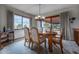 Dining room featuring natural light from large windows at 10353 N Chatfield Dr, Littleton, CO 80125